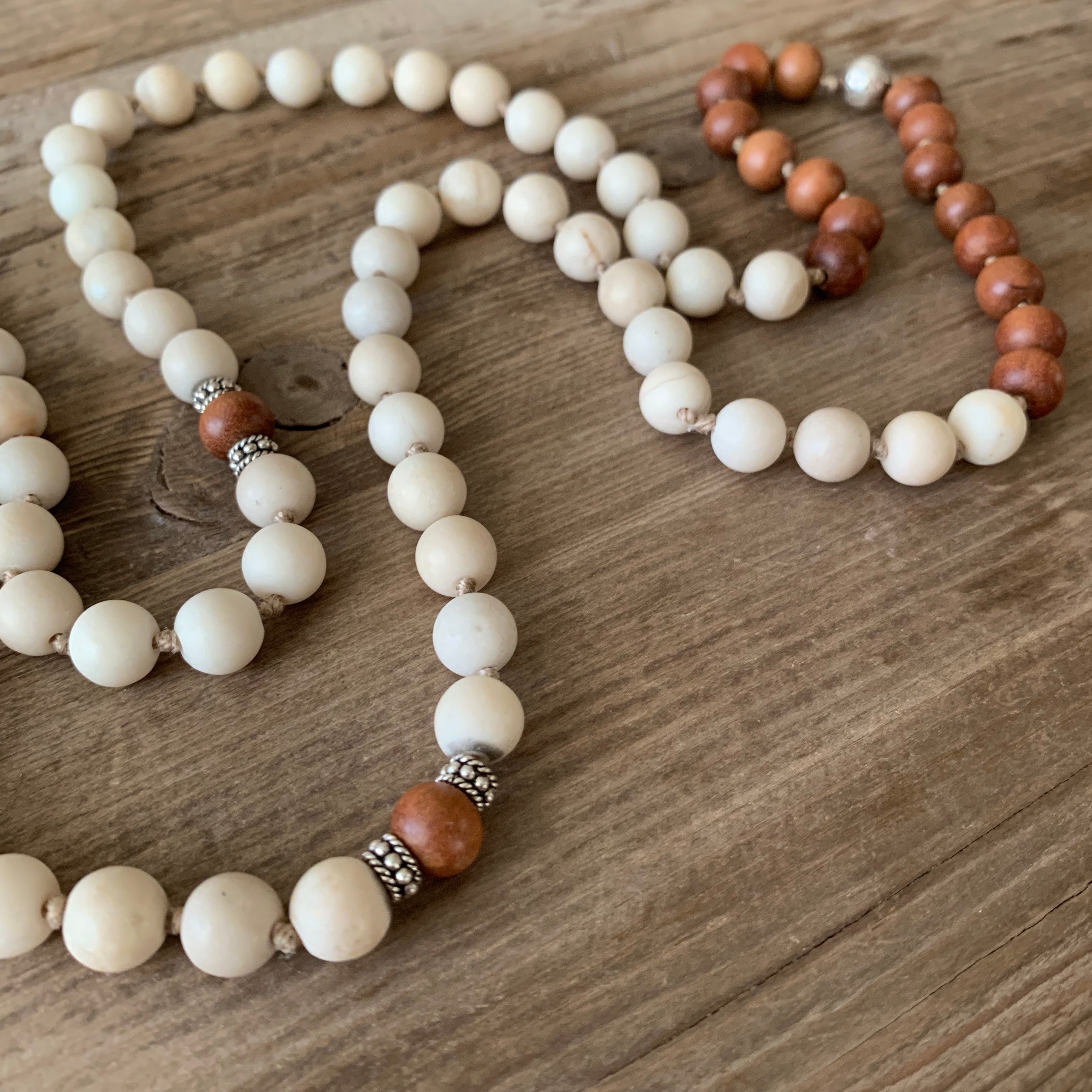 Sunstone and Sandalwood 108 Bead Mala with Buddha Head Guru Bead